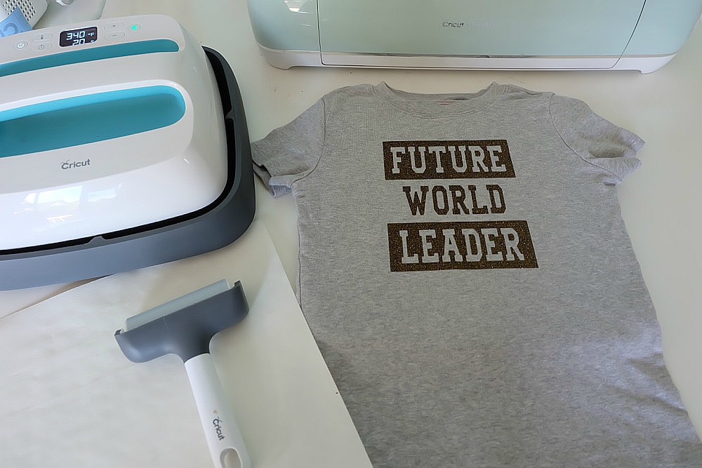 Inspire kids to create a future full of kindness and respect with this DIY Future World Leader Shirt! Includes instructions and a free cut file for making this graphic tee using your Cricut Explore or Cricut Maker. #Cricut #CricutMade #kidsclothing #DIY 