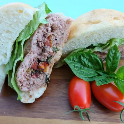 Fire up the BBQ and get out of the hot kitchen! This Caprese Stuffed Turkey Burger Recipe is filled with all of the flavors of summer. Juicy, flavorful and a healthy burger too! You'll feel good about feeding this easy 30 minute meal to your family! #Turkey #Burger #StuffedBurger #Recipe #Sponsored