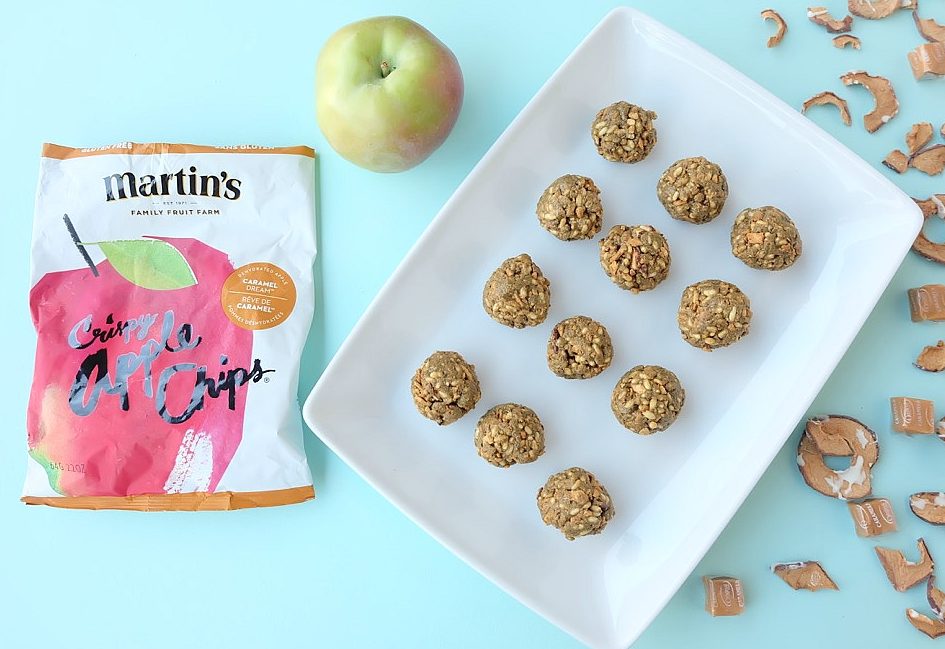 This caramel apple no bake energy bites recipe is delicious, nutritious and perfect for school lunches. It is nut free and easy to make in less than 5 minutes. Packed with protein these bliss balls are a family friendly snack idea. #Recipe #Apples #AppleRecipe #Sponsored