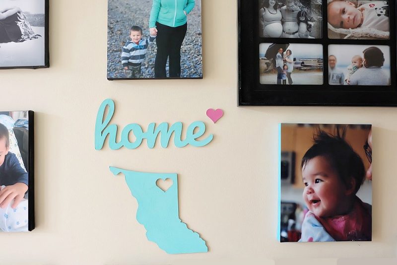 Have you used your Cricut Maker to cut chipboard yet? What are you waiting for? It's amazing and easy! Learn tips for cutting chipboard with the Cricut Maker, how to make a gorgeous DIY Chipboard Home sign for a handmade accent piece on your photo wall and grab our free Home SVG which you can cut with a Cricut or Silhouette. This would also make the cutest handmade housewarming gift! #SVG #FreeSVG #CricutMaker #DIY