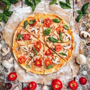 Looking for a delicious dinner idea? Try this 5 minute prep easy pizza dough recipe! Prep your dough in minutes and get the kids cooking with you rolling out there dough and picking their toppings! Makes a super yummy thin crust pizza that your whole family will love! #Recipes #Pizza #Easy #30minutemeal