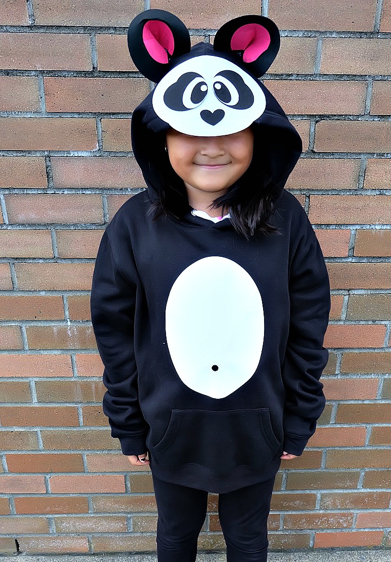 Looking for a fun idea for DIY No Sew Group Halloween Costumes? Look no further! We used HTV, felt a glue gun and our Cricut Maker to create these adorable zoo animal hoodies. We've got free cut files for a giraffe, parrot and panda! Make all three for a fun group halloween costume for kids or adults! #Halloween #DIY #GroupCostume #CricutMaker #Cricut #CricutMade #Sponsored