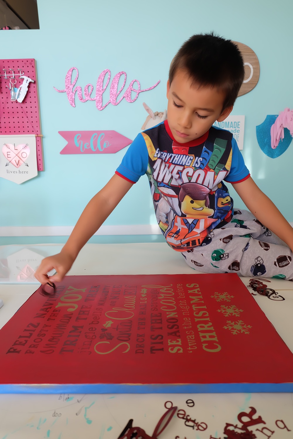 Use your Cricut Explore or Cricut Maker to make a gorgeous DIY Christmas Word Art Canvas Sign! Filled with all the words that make Christmas so special, this handmade Christmas decor will brighten any home! Made with a canvas you can find at the dollar store. This craft project would make a great inexpensive handmade Christmas Gift! #Cricut #CricutProject #DIY #Christmas #HandmadeChristmas