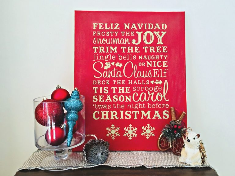 Use your Cricut Explore or Cricut Maker to make a gorgeous DIY Christmas Word Art Canvas Sign! Filled with all the words that make Christmas so special, this handmade Christmas decor will brighten any home! Made with a canvas you can find at the dollar store. This craft project would make a great inexpensive handmade Christmas Gift! #Cricut #CricutProject #DIY #Christmas #HandmadeChristmas
