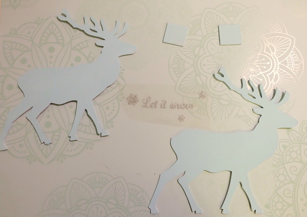 This beautiful DIY reindeer Christmas Ornament is cut using the Cricut Maker! Decorated with "Let It Snow" it makes a beautiful handmade gift idea! This step by step tutorial with photos teaches you how to cut chipboard using your Cricut Maker to make beautiful home decor items. Make handmade reindeer decorations as teacher gifts, gifts for mom, or gifts for a friend. #HandmadeGift #CricutMaker #Christmas #Reindeer