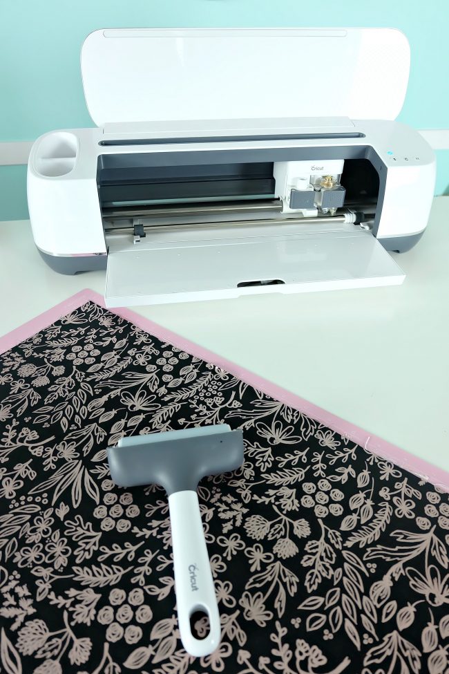 The Cricut Brayer is a great tool for anyone who does Cricut crafts! I love using it to apply fabric to my cutting mat and for applying heat transfer vinyl to shirts.