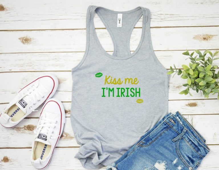 DIY your St. Patrick's Day shirt this year! Pull out your Cricut or Silhouette and get crafting with this easy idea! Use our free St Patricks Day SVG File to cut your own Kiss Me I'm Irish shirt or tank top! #StPatricksDay #StPatricksDayShirt #KissMeImIrish #Cricut #Silhouette