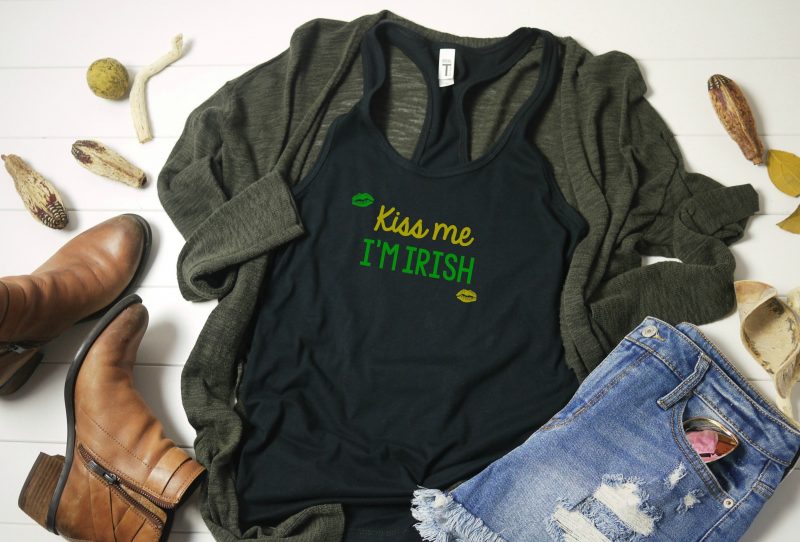 DIY your St. Patrick's Day shirt this year! Pull out your Cricut or Silhouette and get crafting with this easy idea! Use our free St Patricks Day SVG File to cut your own Kiss Me I'm Irish shirt or tank top! #StPatricksDay #StPatricksDayShirt #KissMeImIrish #Cricut #Silhouette