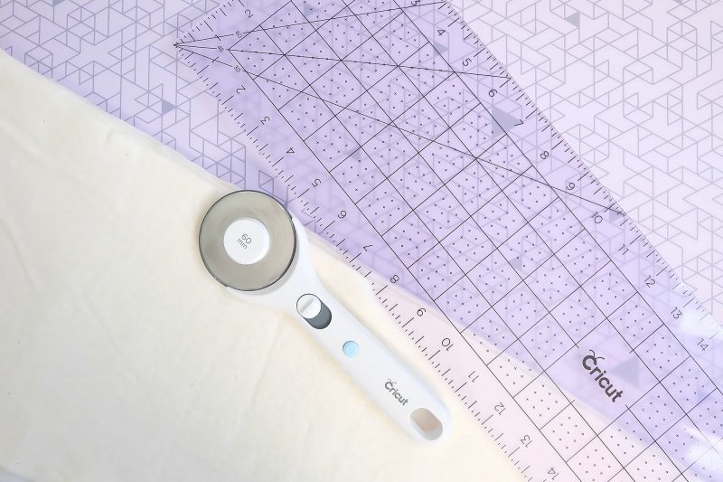 The Cricut Rotary Cutter, Self Healing Mat and Acrylic Ruler are sewing room essentials for every crafter! #Cricut #Sponsored #CraftRoom #CraftTools #sewing