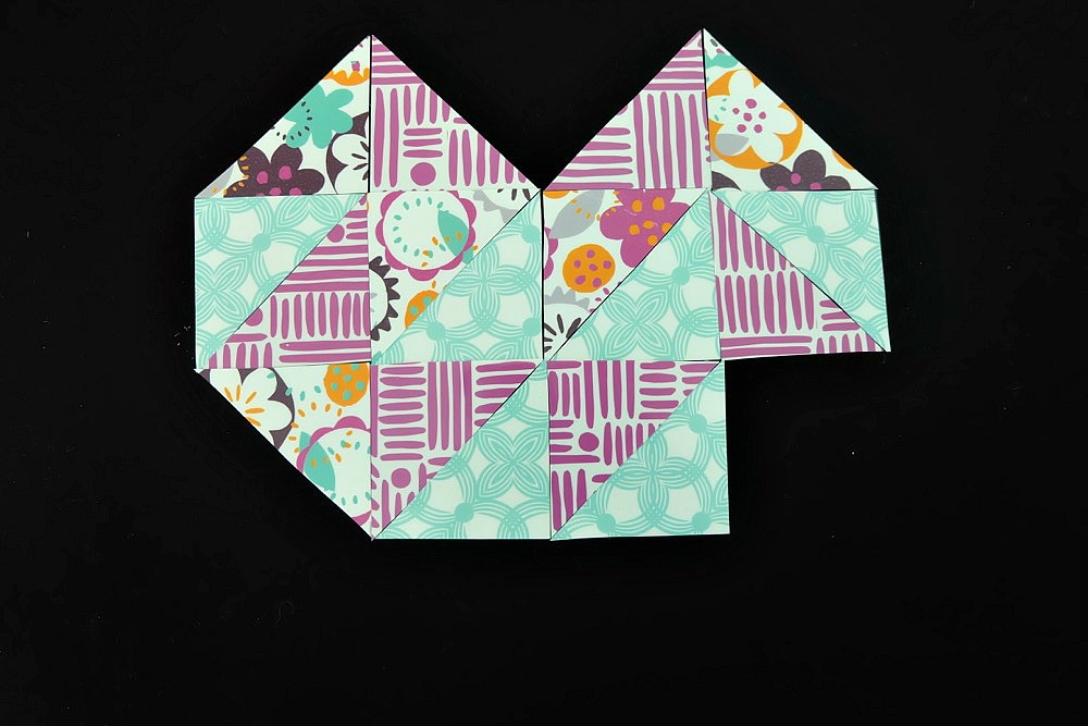 Learn how to make DIY Shirts with Iron On HTV even if you don't have a cutting machine! We share how to make a hand lettered iron on applique as well as a geometric heart design cutting by hand! #CricutMade #DIYShirts #Sponsored #Cricut #HTV