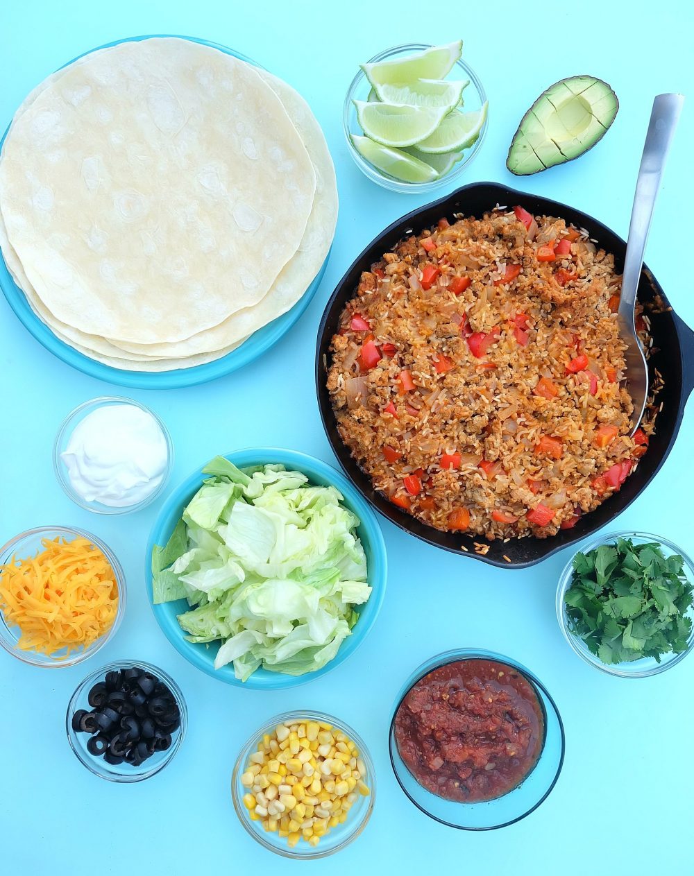 Looking for a quick and easy, one pan healthy dinner idea that will feed a crowd? This turkey and rice Mexican casserole recipe only takes 10 minutes to prep, then you pop it in the oven. Perfect for filling tacos, burritos or using as a topping for taco salad! A healthy, delicious and family friendly meal idea! #MakeItWithTurkey #Recipe #Mexican #Turkey #OnePan
