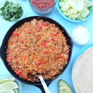 This quick and easy family friendly turkey and rice Mexican casserole recipe is a healthy one pan meal that takes 10 minutes to prep! Perfect for feeding a crowd or for multiple meals. Use it as a filling for tacos, burritos or as a topping for taco salad! #MakeItWithTurkey #Recipe #MexicanFood #Turkey #OnePan #sponsored