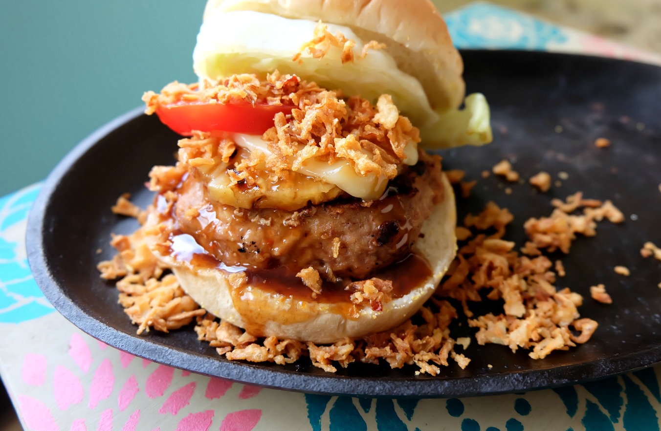 Fire up the BBQ and get out of the hot kitchen! We're sharing with you the best burger recipe you've ever tasted-- Our Hawaiian Turkey Burger Recipe. We're also sharing our secrets for making the juiciest turkey burger you've ever eaten. Juicy, flavorful and healthy you'll feel good about feeding this easy meal to your family! #Turkey #Burger #HawaiianFood #Recipe #Sponsored