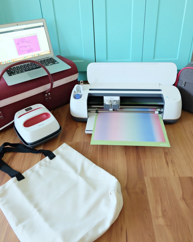 Make a gorgeous rainbow "watercolor" craft tote bag using Cricut Infusible Ink! We're sharing all the tips and tricks that you need to know to use Cricut Infusible Ink! Follow along as we share step by step instructions for this fun and easy craft project! #CricutMade #crafting #infusibleink #sponsored