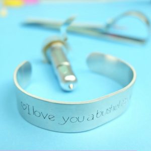 Learn how to use your Cricut Maker to engrave and make a pretty DIY Engraved Quote Bracelet in 10 minutes or less. A beautiful and easy personalized handmade gift idea. #CricutCreated #CricutMade #DIYJewelry #HandmadeGift