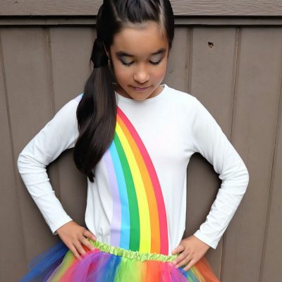 Create an Easy DIY Rainbow Halloween Costume out of leggings and a white shirt using your Cricut Maker or Cricut Explore Air 2! We're sharing step by step photos and the cut file to create this costume at home! #Cricut #HalloweenCostume #Rainbow #CricutCreated #Sponsored