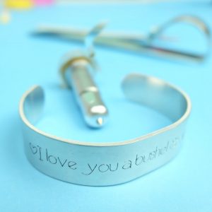 Learn how to use your Cricut Maker to engrave and make a pretty DIY Engraved Quote Bracelet in 10 minutes or less. A beautiful and easy personalized handmade gift idea. #CricutCreated #CricutMade #DIYJewelry #HandmadeGift