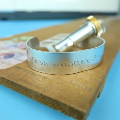 Learn how to use your Cricut Maker to engrave and make a pretty DIY Engraved Quote Bracelet in 10 minutes or less. A beautiful and easy personalized handmade gift idea. #CricutCreated #CricutMade #DIYJewelry #HandmadeGift