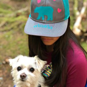 Make a DIY Mama Bear Trucker Hat using your Cricut with our easy step by step instructions! The perfect handmade gift for moms, new mamas and mommies to be! So fun to wear camping and in the great outdoors! An easy project for the Cricut Maker or Cricut Explore using the Cricut EasyPress Mini! #CricutCreated #CricutMade #DIYCamping #MomGift #Sponsored