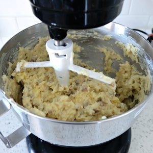 This rustic garlic mashed potatoes recipe makes the perfect Thanksgiving side dish, topping for shepherds pie or for when you're craving potatoes! No potato peeling required! Whip up with your stand mixer! #MashedPotatoes #Thanksgivingsidedish