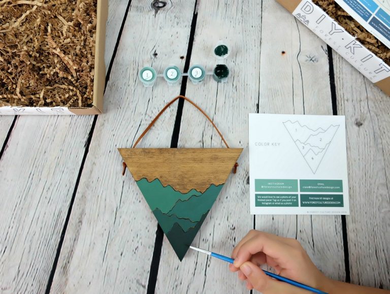 These DIY Paint By Number Wall Art Kits are so much fun for a craft night with family or friends. Makes a great handmade gift idea! #DIY #WoodArt #WallArt #Handmade