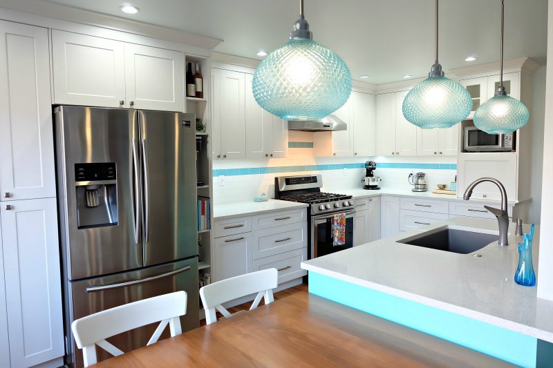 Hello Creative Family selected a palette of white, grey, teal, turquoise and aqua for their kitchen renovation! This DIY turquoise kitchen remodel includes a colorful island and other smart features. Also check out her 20 Tips for a Smooth Kitchen Renovation! #Sponsored #Turquoise #Kitchen #Aqua #KitchenRemodel #kitchenrenovation
