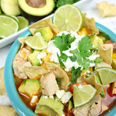 Take those Christmas or Thanksgiving Turkey Leftovers and turn them into an incredible delicious and healthy meal your family will love with this Turkey Tortilla Soup Recipe! Perfect to warm you up on a cool day! #Sponsored #Turkey #Soup #Recipe #TurkeyTraditions