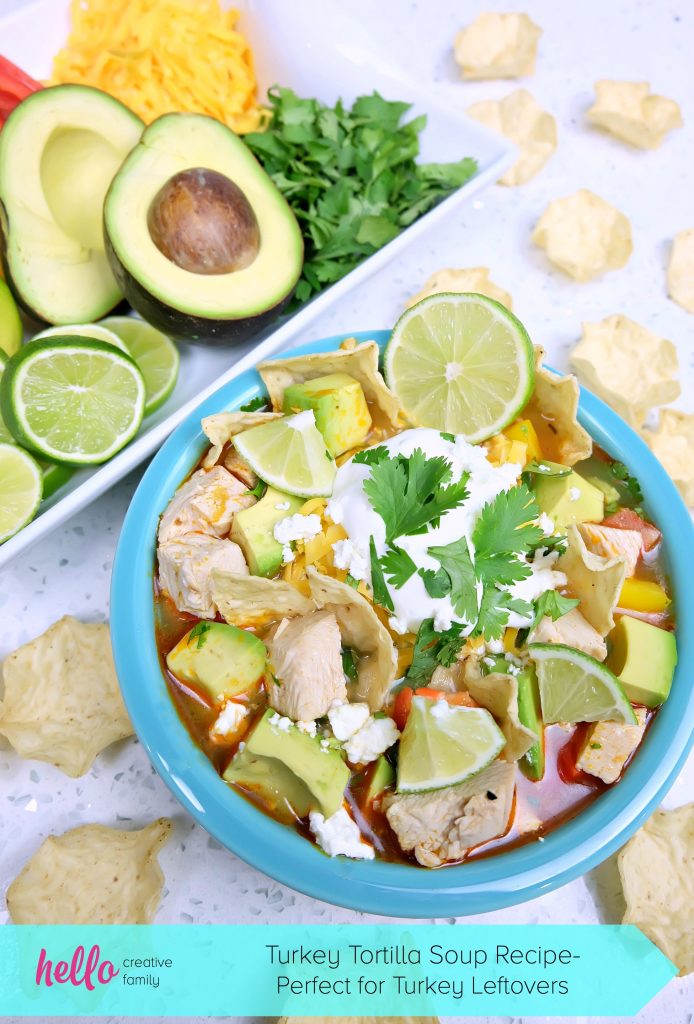 Take those Christmas or Thanksgiving Turkey Leftovers and turn them into an incredibly delicious and healthy meal your family will love with this Turkey Tortilla Soup Recipe! Perfect to warm you up on a cool day! #Sponsored #Turkey #Soup #Recipe #TurkeyTraditions