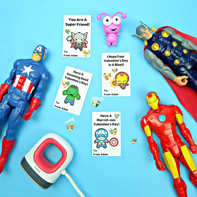 Cricut makes personalized classroom Valentine's Day cards so easy! We're making DIY Marvel Avengers Valentine's Day Cards that your kids can personalize with iron-on stickers. Make this fun and simple Print and Cut Cricut craft with your kids in less time than it would take to run to the store to buy boxed Valentines! #Sponsored #Cricut #CricutCreated #Avengers #Marvel #ValentinesDay #Valentinesdaycrafts