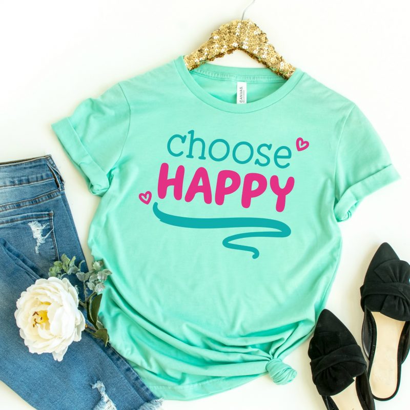 Choose happy with this uplifiting growth mindset svg file! Use this cut file with your Cricut, Silhouette or other electronic cutting machine to create shirts, mugs, journals and more. A fun and easy Cricut crafts project with an inspirational quote that supports positive mental health! #Cricut #Silhouette #CricutMade #CricutCrafts #Crafts #InspirationalQuotes