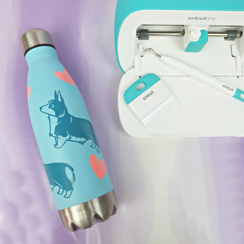 Looking for a cute, creative and easy 10 minute Cricut Project? This DIY Puppy Love Water Bottle is quick, easy and so adorable! A family friendly project you can make with your Cricut Maker, Cricut Explore Air 2 or Cricut Joy! #CricutMaker #CricutExplore #CricutJoy #CricutMade #CricutCrafts #Cricut #DIY #Craft #QuickCrafts #EasyCrafts #CricutCreated 