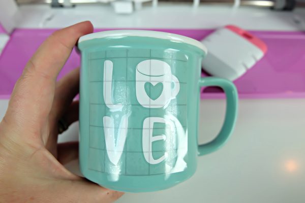 New to Cricut crafting and don't know where to start? Applying vinyl to mugs and cups is a great beginner Cricut Craft project! We're sharing everything you need to know to make a beautiful handmade mug from uploading the cut file, to applying vinyl that will last! #CricutCrafts #Cricut #CricutCreated #Handmade #CricutBasics #Cricut #Vinyl #handmadegift #Cricut101 #BeginnerCrafts #CuttingMachine #Crafts #CustomMugs #mugs