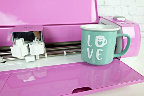 New to Cricut crafting and don't know where to start? Applying vinyl to mugs and cups is a great beginner Cricut Craft project! We're sharing everything you need to know to make a beautiful handmade mug from uploading the cut file, to applying vinyl that will last! #CricutCrafts #Cricut #CricutCreated #Handmade #CricutBasics #Cricut #Vinyl #handmadegift #Cricut101 #BeginnerCrafts #CuttingMachine #Crafts #CustomMugs #mugs