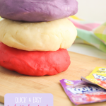 Making homemade play dough is quick and easy with this kool aid play dough recipe! The best play dough recipe you will ever find with simple ingredients! Smells good, is soft, pliable and easy to make in minutes. #Playdough #kidscrafts #Koolaid #kidsactivities #homemade