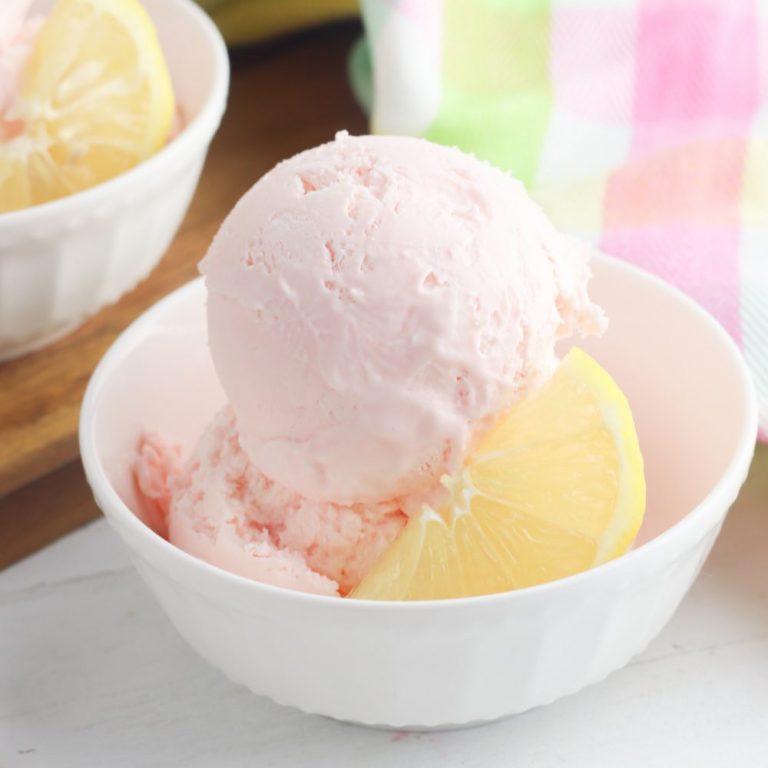 The perfect cool summer treat! This easy no churn pink lemonade ice cream recipe uses just 3 ingredients and doesn't require an ice cream maker! Make the simple base in just 10 minutes. Sure to become a family favorite! #IceCream #recipe #pinklemonade #summerrecipe #nochurn #nochurnicecream #dessert #pinkdessert #homemade #homemadeicecream