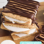 All the flavor of campfire smores without going camping! This No Bake Smores Recipe is a quick and easy, delicious dessert idea that can be made at home in minutes! Chocolate, graham cracker, marshmallow fluff! Who could ask for more? #smores #Dessert #EasyDessert #DessertIdea #CampingBirthday #homemade #Recipe #Marshmallow
