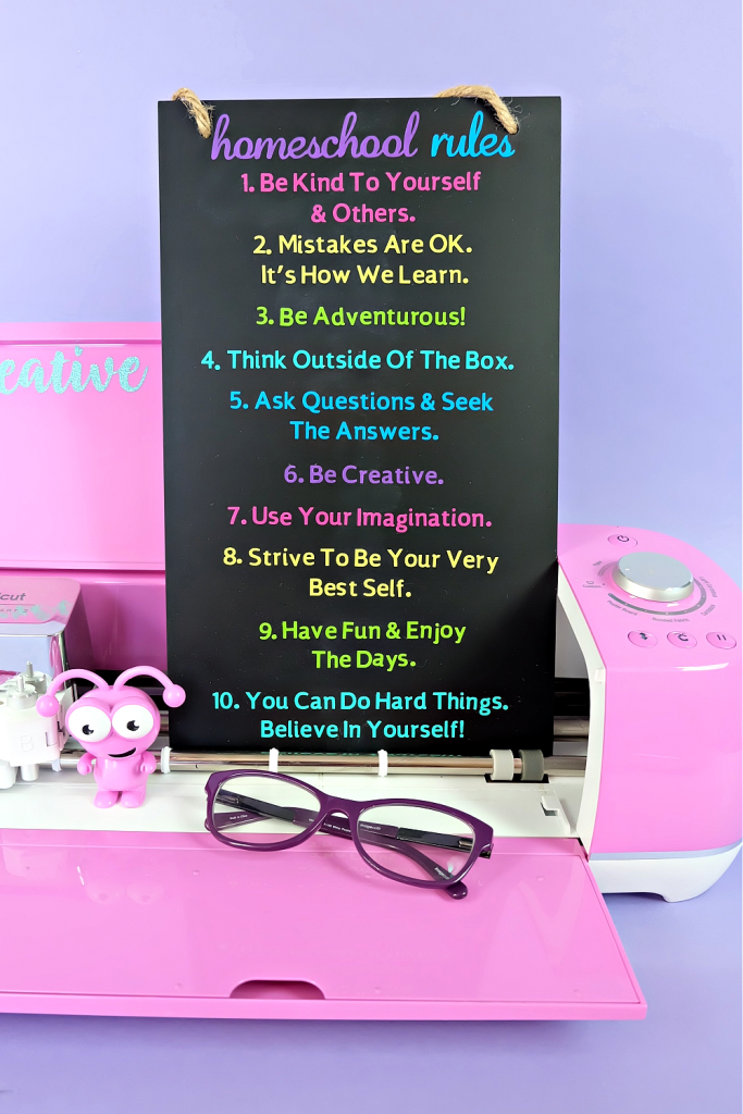 Make a personalized Cricut Homeschool Rules Sign with this fun craft tutorial. Personalize with your family's own rules to make a beautiful keepsake wood homeschool rules sign with your Cricut Maker, Cricut Explore Air 2 or Cricut Joy! #CricutCreated #CricutMade #Homeschool #CricutCrafts #HomeschoolCrafts #Homeschoolrules #woodsign #vinyl