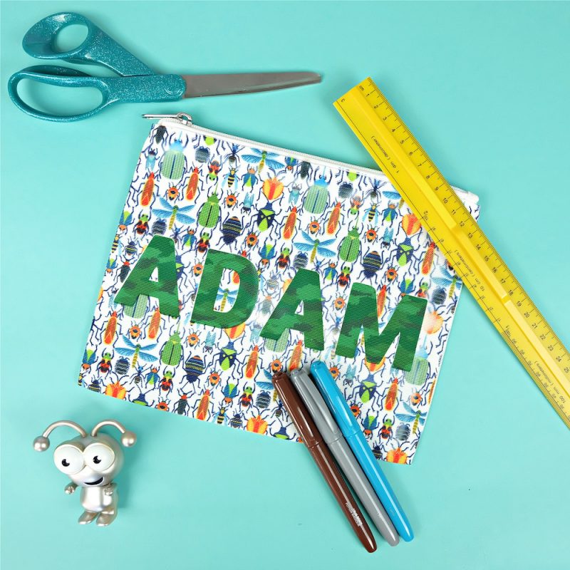 Send your kids back to school in style with a super fun 10 minute DIY project! This Cricut Infusible Ink Pencil Pouch is so easy to make! Customize it with your child's favorite pattern of Infusible Ink and their name for a handmade back to school supply they'll love! #Cricut #InfusibleInk #BackToSchool #DIYBackToSchool #PencilPouch #handmade #DIYSchoolSupplies #CricutMade #CricutCreated #CricutCrafts