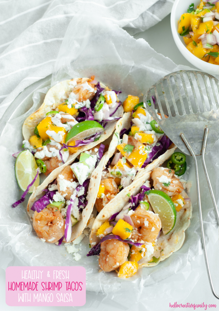 What's for dinner? This homemade shrimp tacos recipe with mango salsa is fresh, healthy and delicious! This easy 30 minute dinner meal idea is made with whole foods and delicious flavors that the entire family will love! #Tacos #Shrimp #mango #recipe #summer #cilantro #30minutemeal #homemade #Easy #mealplanning