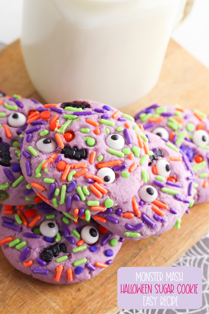 They're creepy and they're kookie, they're all together spooky! Grab this easy Monster Mash Halloween Sugar Cookie Recipe for baking with kids! Perfect for family Halloween fun and classroom Halloween party snack ideas! #Recipe #cookies #Halloween #Monster #PurpleFood #FamilyFriendly #CookingWithKids #Homemade