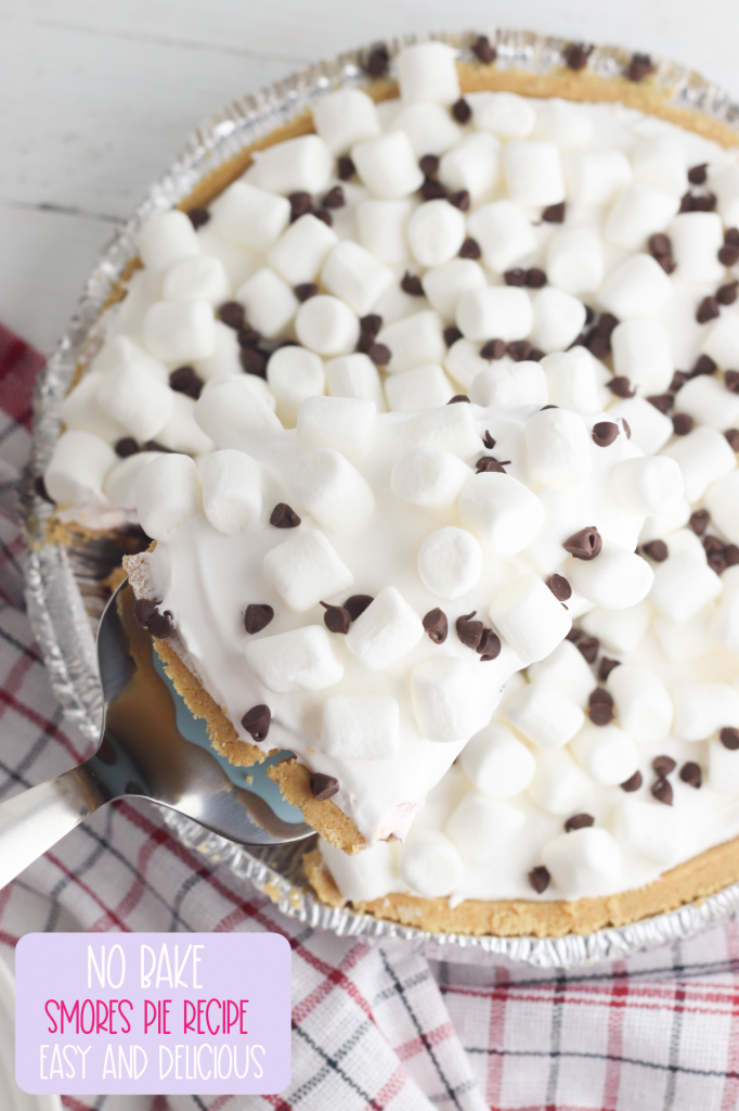 Create a delicious, easy dessert in just 10 minutes with this No Bake Smores Pie Recipe! The ultimate comfort food dessert, that gives you a slice of summer all year long! Kid friendly and perfect for entertaining and potlucks! #Dessert #Smores #Recipe #ComfortFood #nobake #camping #summer