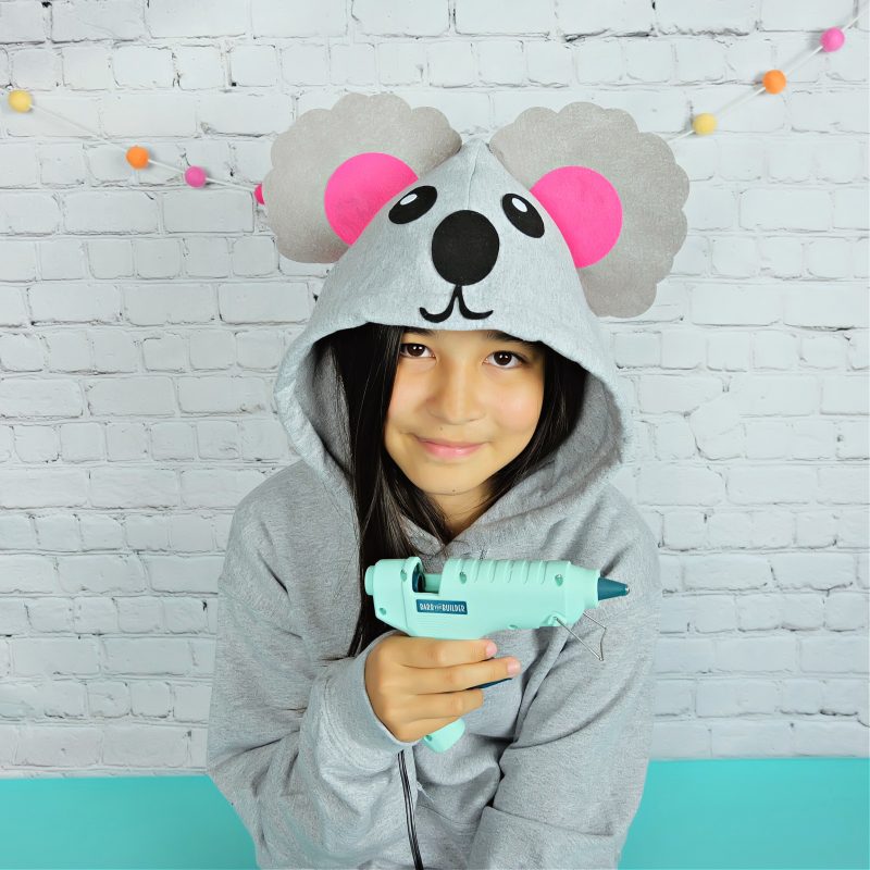 Looking for a quick and easy Halloween costume idea? This Easy 15 Minute No Sew Koala Halloween Costume is made using a hooded sweatshirt, felt and a glue gun! Includes a free template and an SVG file to cut with your Cricut or other electronic cutting machine! #koala #Halloween #NoSewCostume #handmade #Cricut #CricutMade #CricutCreated #CricutHalloween