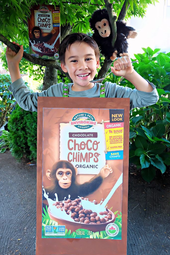 Make a cereal box costume using materials that you already have on hand including a cardboard box, glue from a glue gun and ribbon! Our costume features the adorable Choco Chimps cereal box! A fun, adorable and environmentally friendly halloween costume idea! #Halloween #Chimp #HalloweenCostume #DIYCostume #Handmade #Cereal 