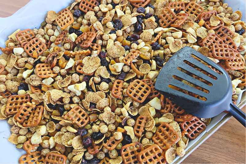 This delicious pumpkin spice fall snack mix recipe is the perfect snack for kids (and adults) looking for a healthy snack. Vegan and nut free, this cereal trail mix recipe is school safe and is a perfect classroom halloween party snack idea! #snack #Recipe #SnackIdea #trailmix #snackmix #cerealmix #cerealrecipe #halloween #fall #autumn #pumpkinspice #homemade #kidfriendly #kidscooking #kidsbaking #snackmix