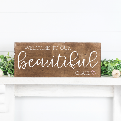 Make beautiful handmade gifts for family and housewarming with this Welcome To Our Beautiful Chaos cut file! Also includes 15 free family themed SVG files from your favorite craft bloggers. Use these cut files with your Cricut Maker, Cricut Explore, Silhouette Cameo or other electronic cutting machines to make beautiful family signs and more. #Crafts #handmadegifts #DIY #FamilySign #Family #SVGFiles #CricutCreated #CricutMade #CutFiles #FreeCutFiles #FreeSVG #farmhousedecor