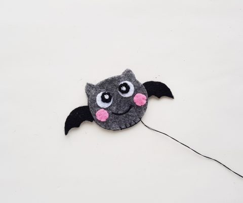 Learn to sew a bat stuffed animal with this simple sewing project! The perfect project for beginner sewers! Includes step by step photos and a free pattern. A fun little Halloween project! #sewing #Bat #StuffedAnimal #BeginnerSewing #SewingProject #TeensSewing #Felt