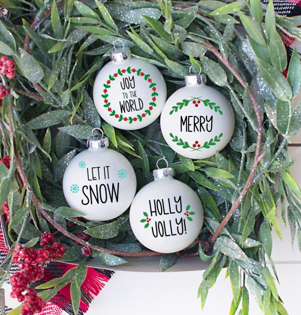 Create beautiful Christmas ornaments and holiday decor with this beautiful farmhouse style Christmas Ornament Cut File bundle! Use these design files with your Cricut or Silhouette to cut vinyl, htv and more to make ornaments, Christmas bags, Christmas cards, pillow case covers, signs, sweatshirts, mugs and other handmade Christmas gifts! #Christmas #ChristmasCrafts #CricutCrafts #ChristmasCrafting #SVGFiles #CutFiles #ChristmasSVG