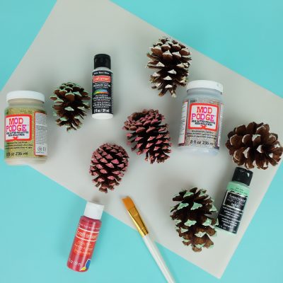 Easy step by step instructions for making DIY Pinecone Ornament that look like gnomes. A fun and adorable pinecone craft for Christmas.