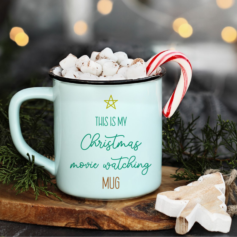 Do you love Christmas movies? Me too! There's nothing better than curling up on the couch with a mug of something warm cupped in your hands, the fire roaring and a good Christmas movie on the TV. Create an adorable "This Is My Christmas Movie Watching Mug" for your hot chocolate, tea or coffee! Make extras as fun and festive handmade gifts for yourself your Christmas movie watching friends and family members using this cut file and your Cricut, Silhouette or other electronic cutting machine! #CricutChristmas #Cricut #Silhouette #Handmade #SVGFile #CutFile #ChristmasSVG #ChristmasCrafts #ChristmasCrafting #ChristmasMovies
