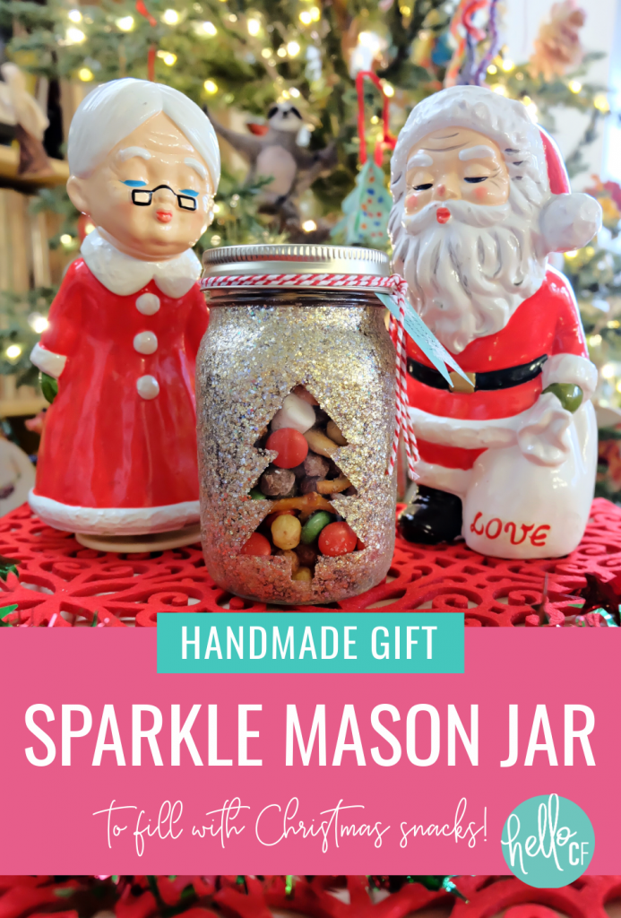 Learn how to make a DIY Sparkle Mason Jar that's perfect for filling with yummy snacks for a one of a kind handmade Christmas gift! This project uses glitter Mod Podge so you don't end up with glitter all over your craft space! #HandmadeGift #DIY #Sparkle #Glitter #MasonJar #masonjarideas #masonjargifts